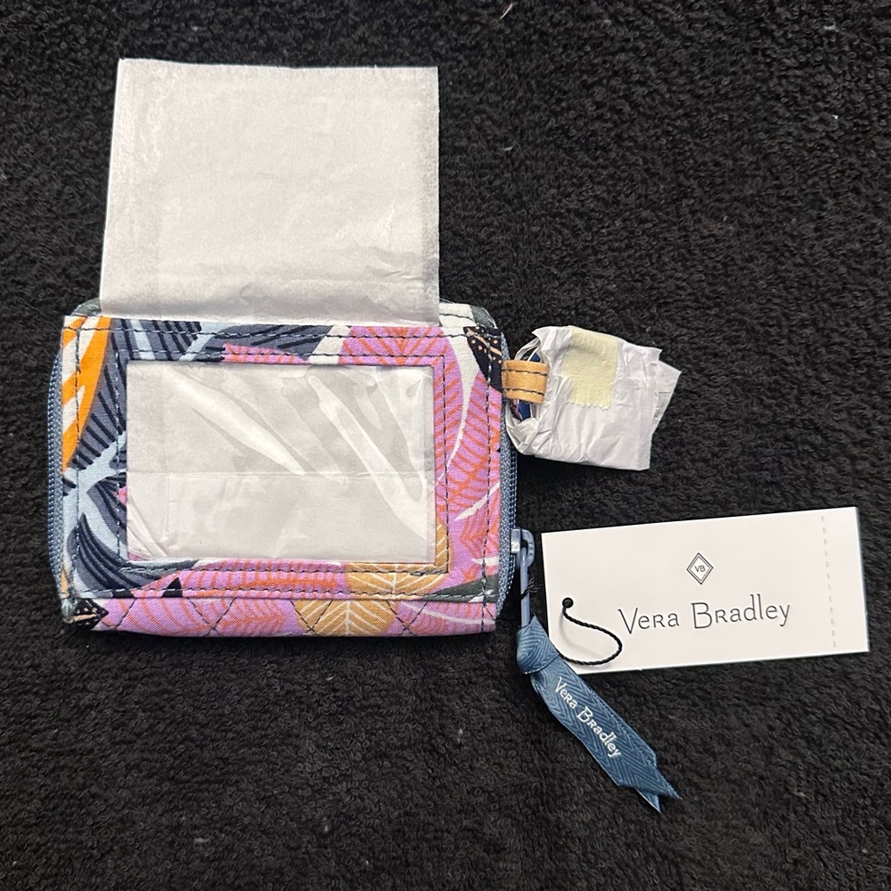 NWT Vera Bradley RFID Petite Zip Around Wallet in Palm Floral Pattern.